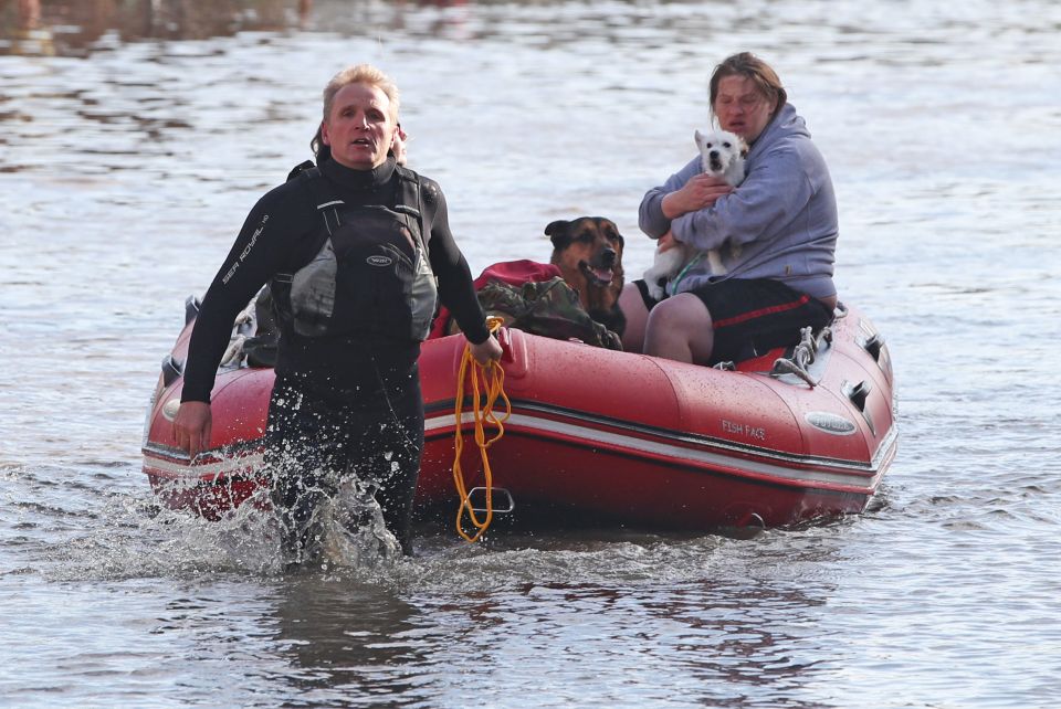  People being taken to safety in boats after heavy rains caused flooding in Doncaster