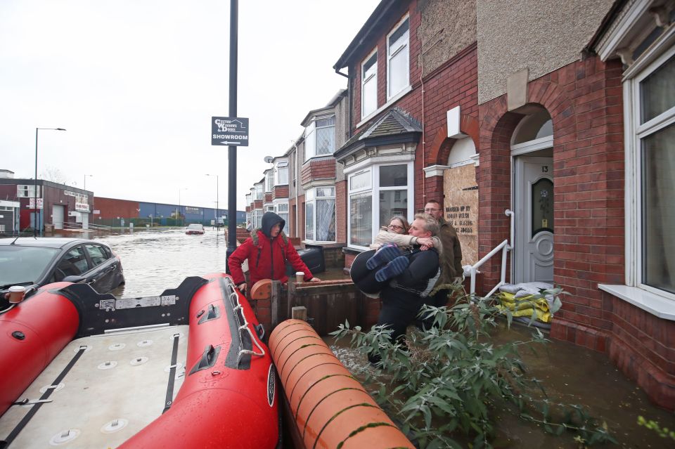  Residents were carried into rescue boats in Doncaster after more than a month of rain was dumped in 24 hours