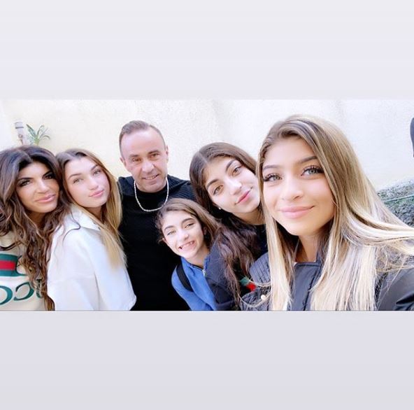  Teresa and the couple's daughters recently visited Joe in Italy