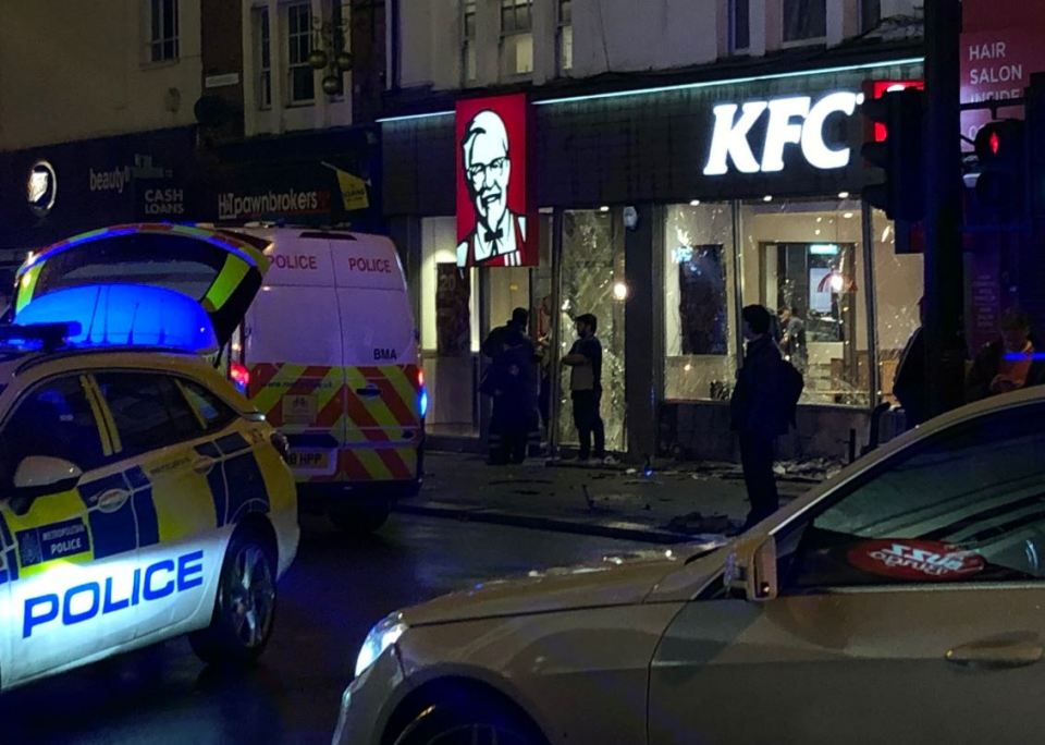  Five people had to be taken to hospital after a car smashed into a KFC near Tooting Broadway last night