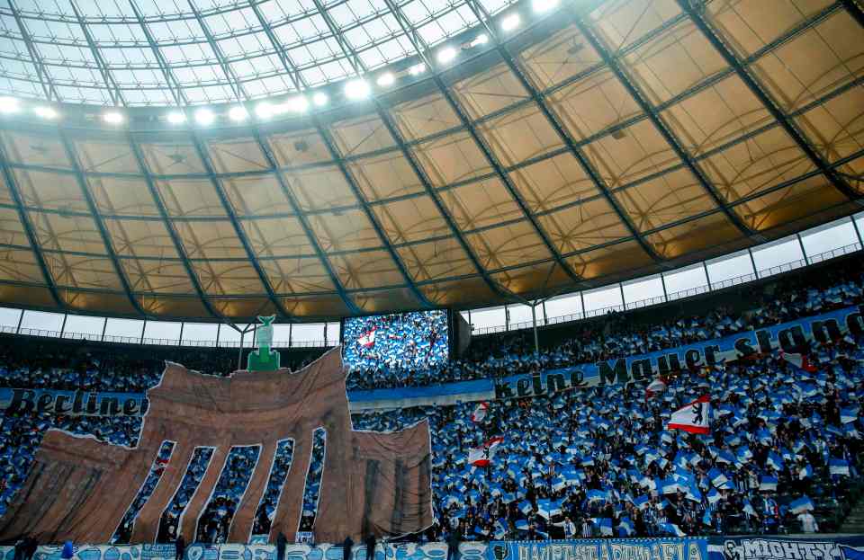  A picture of the Brandenburg Gate is spread out across the fans