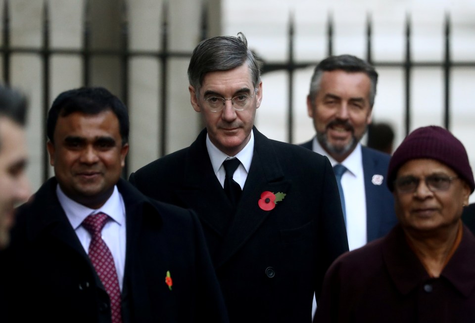  Tory minister Jacob Rees-Mogg arrives at the memorial in central London