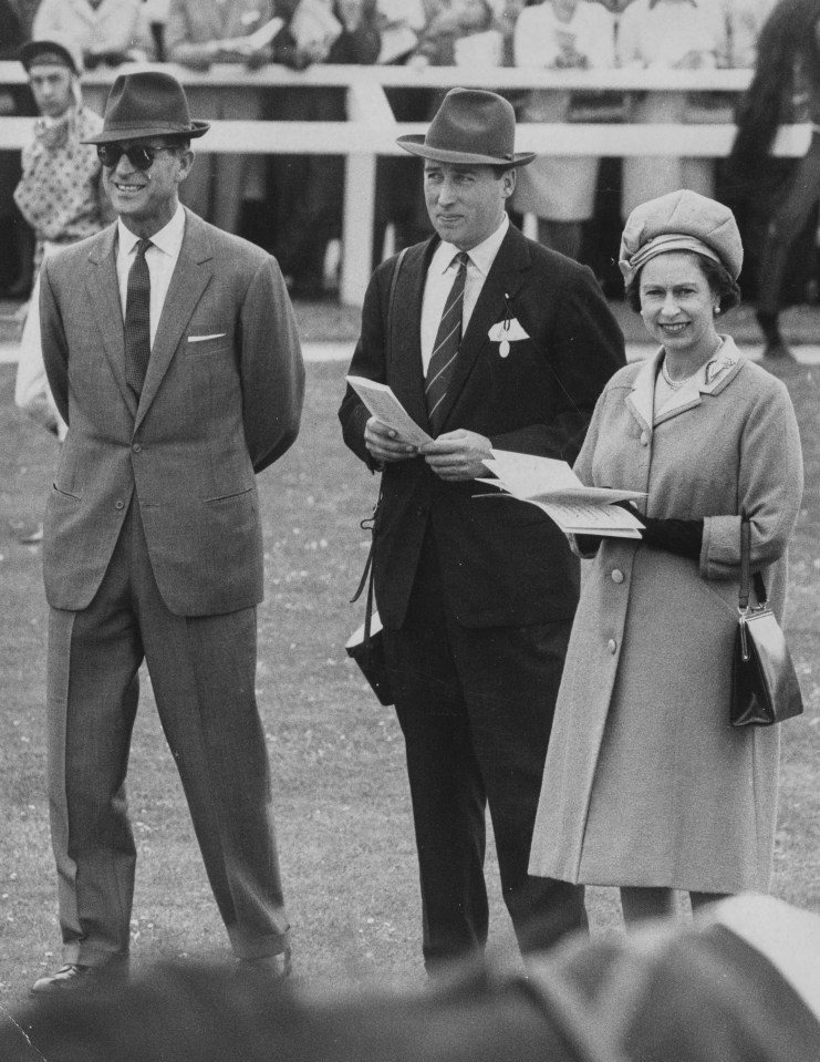  The Queen seen with Prince Philip , left, and Lord Porchester in 1969