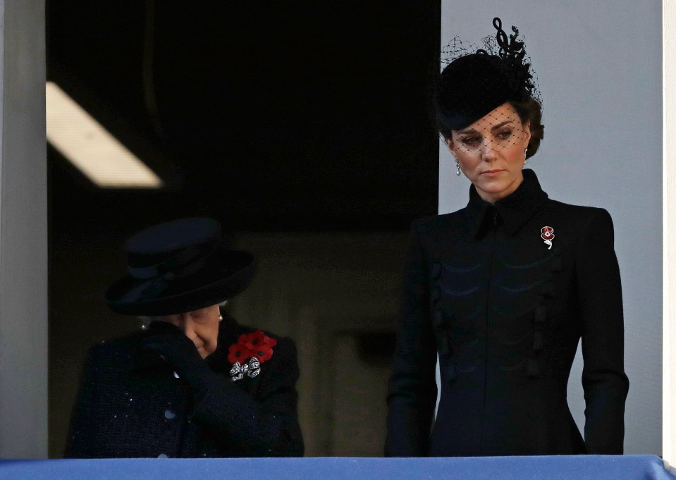  The Queen appears emotional at the service honouring the country's war heroes alongside Kate Middleton