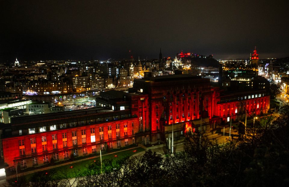  St Andrew's House in Edinburgh is illuminated red ahead of Armistice Day in support of the Scottish Poppy Appeal