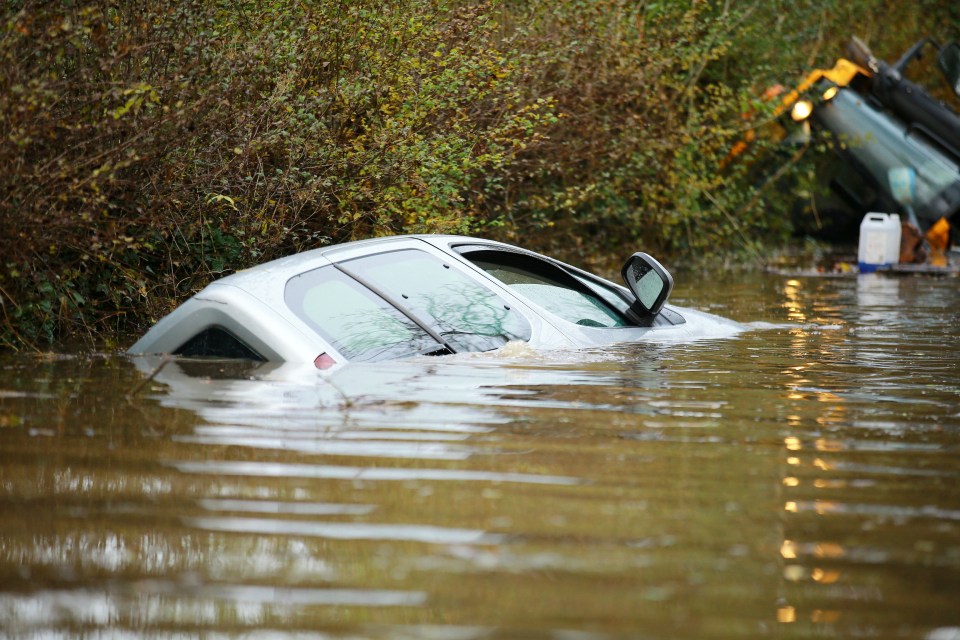  A car is submerged in Doncaster, which is still cut off and without power