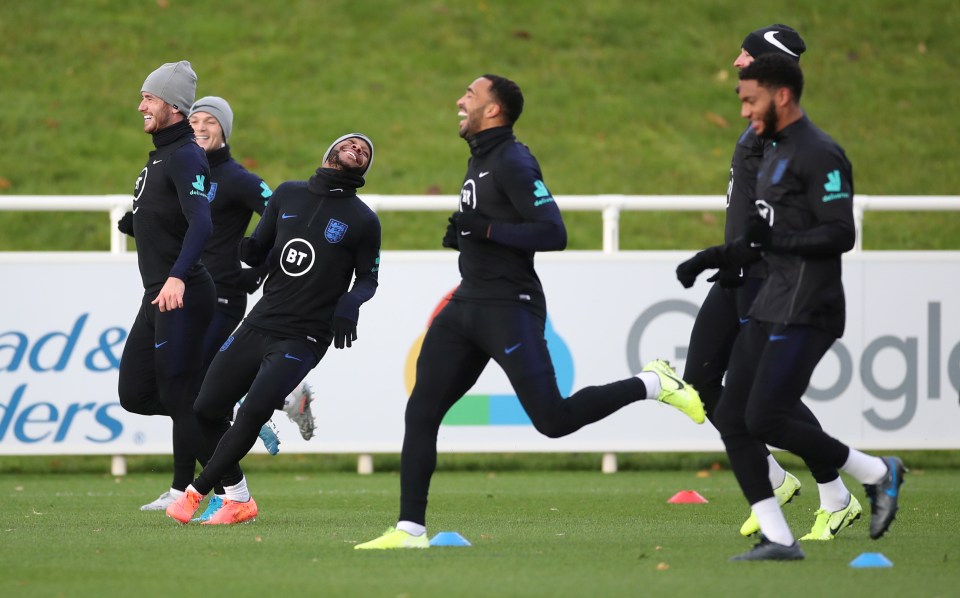  Gomez and Sterling train at St George's Park ahead of the clash against Montenegro