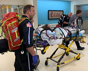  The teenager pictured being taken into hospital after his lungs failed