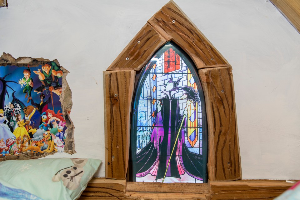  Dad Richard even added stain glass windows featuring Maleficent