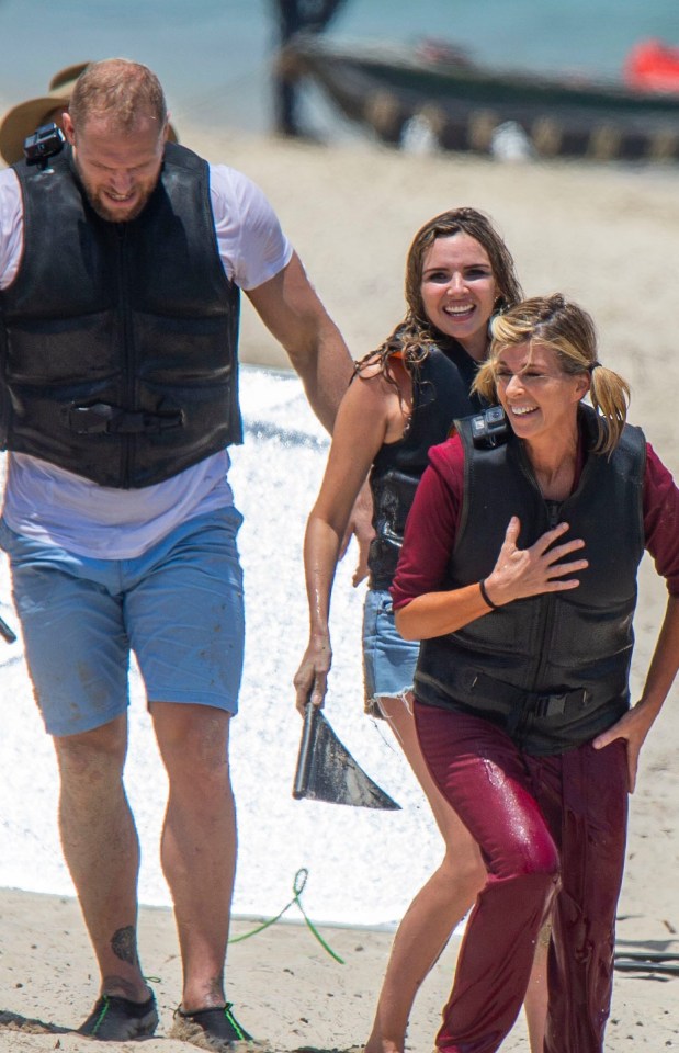 Soaked celebs Kate, Nadine and James struggle ashore at Paradise Beach in Australia