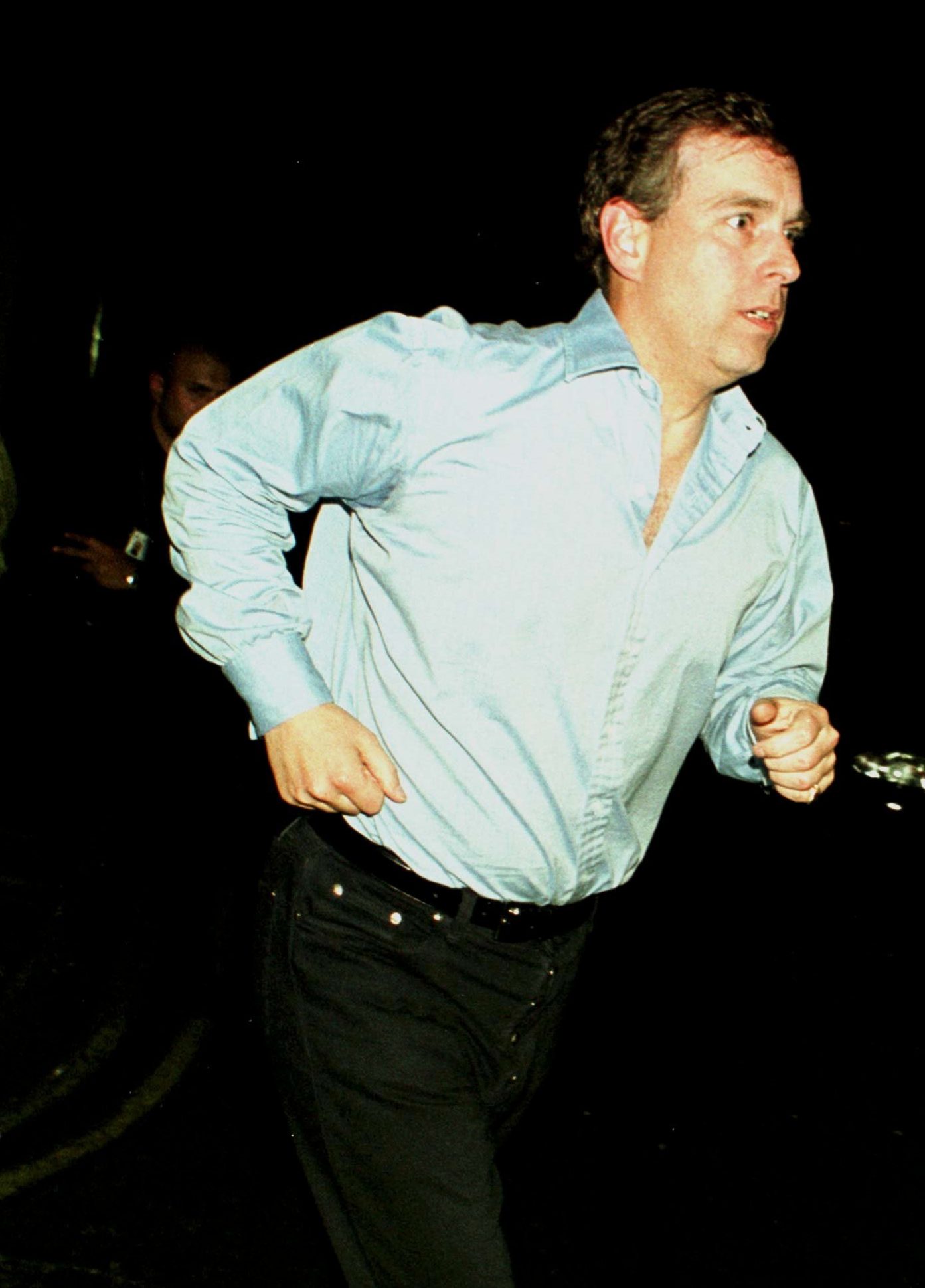 Prince Andrew leaving Chinawhite nightclub in 2000 – is he sweating?