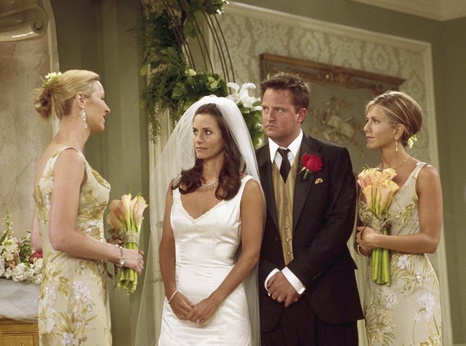 Rachel was just a couple weeks pregnant at Monica and Chandler's wedding which took place in May 2001