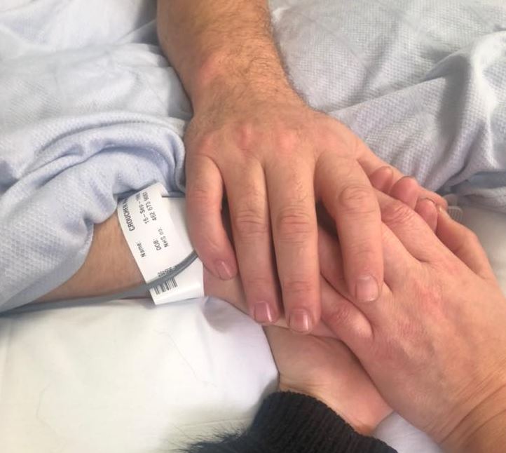  Dad John, Mum Tracey and sister Jade lay their hands on Haydon's during his last moments in hospital