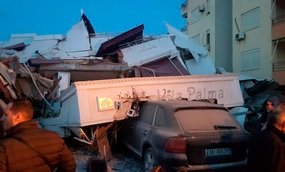  A witness described residents fleeing apartment buildings in Tirana, some carrying babies