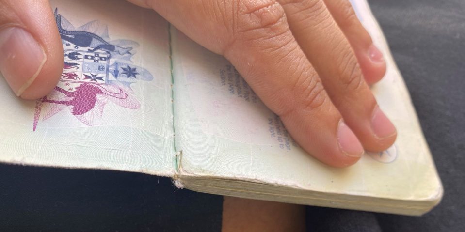  A football player was left unable to travel after her passport was deemed to be too damaged