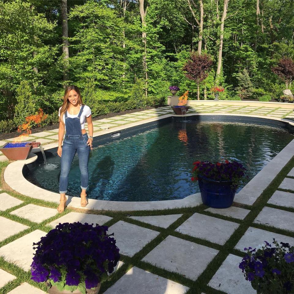  The family loves to cool down poolside in the summertime