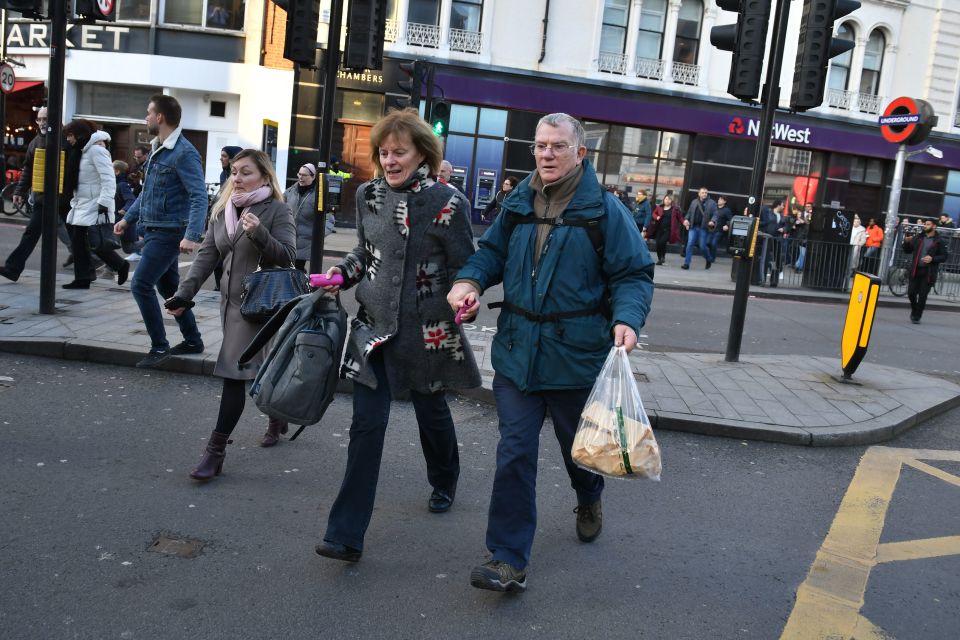  A man and woman flee as cops yelled at them to move