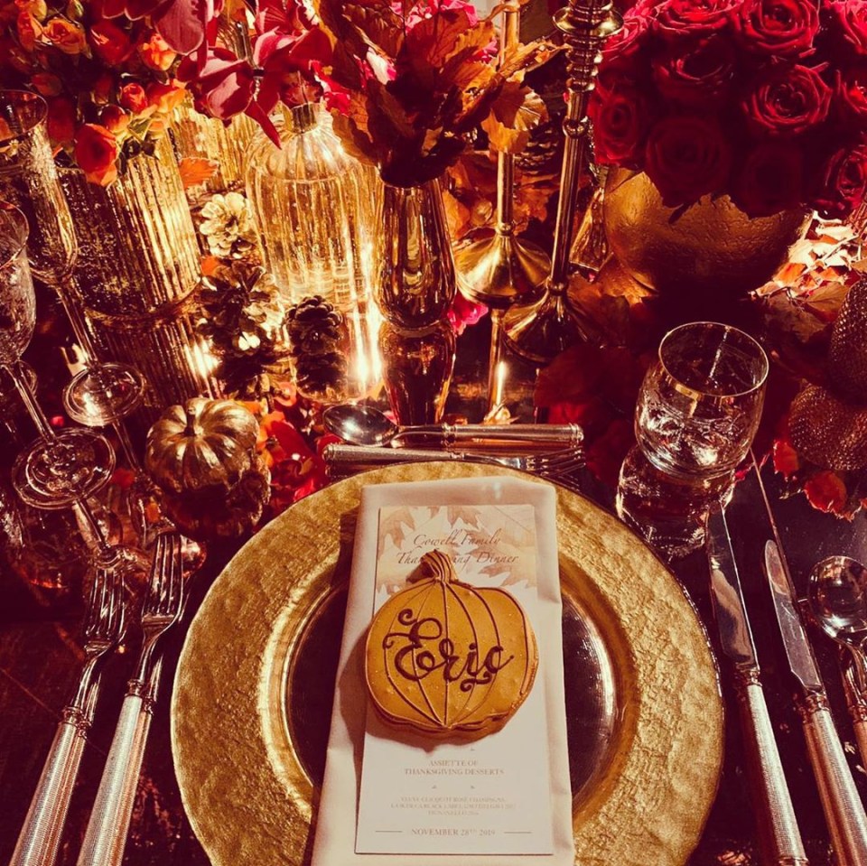  The Cowell Family Thanksgiving Dinner menu is seen on a gold plate and surrounded by warm autumn decor