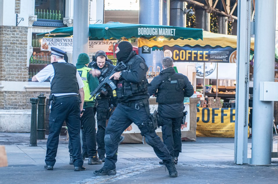 Police ushered people away from Borough Market this afternoon