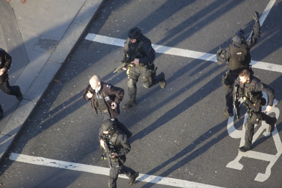 Heavily armed police were praised for running towards danger