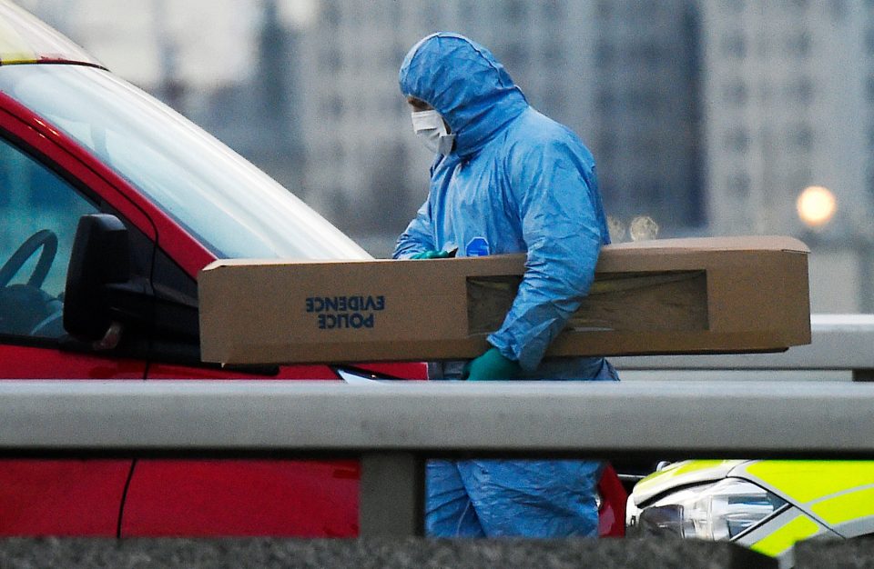  Forensics officers remove the tusk from the scene of the London Bridge terror attack