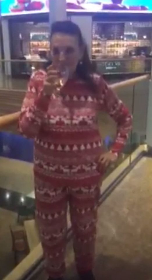  Irene Ratcliffe, 84, drinks a grandy and ginger drink in her Primark pjs while trapped inside Meadowhall