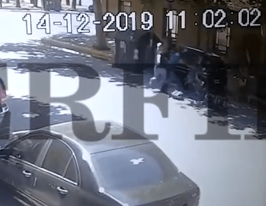  Shocking footage shows one of the men being shot on the street