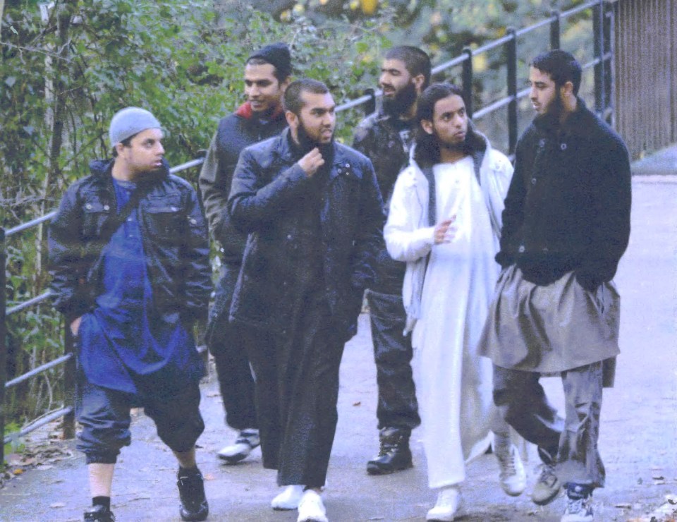  Usman Khan, pictured fourth from left in the back, with fellow defendants at the time