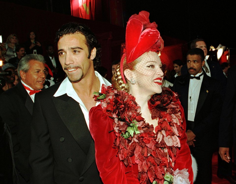  He joined her at the world premiere of the film 'Evita' in LA in 1996