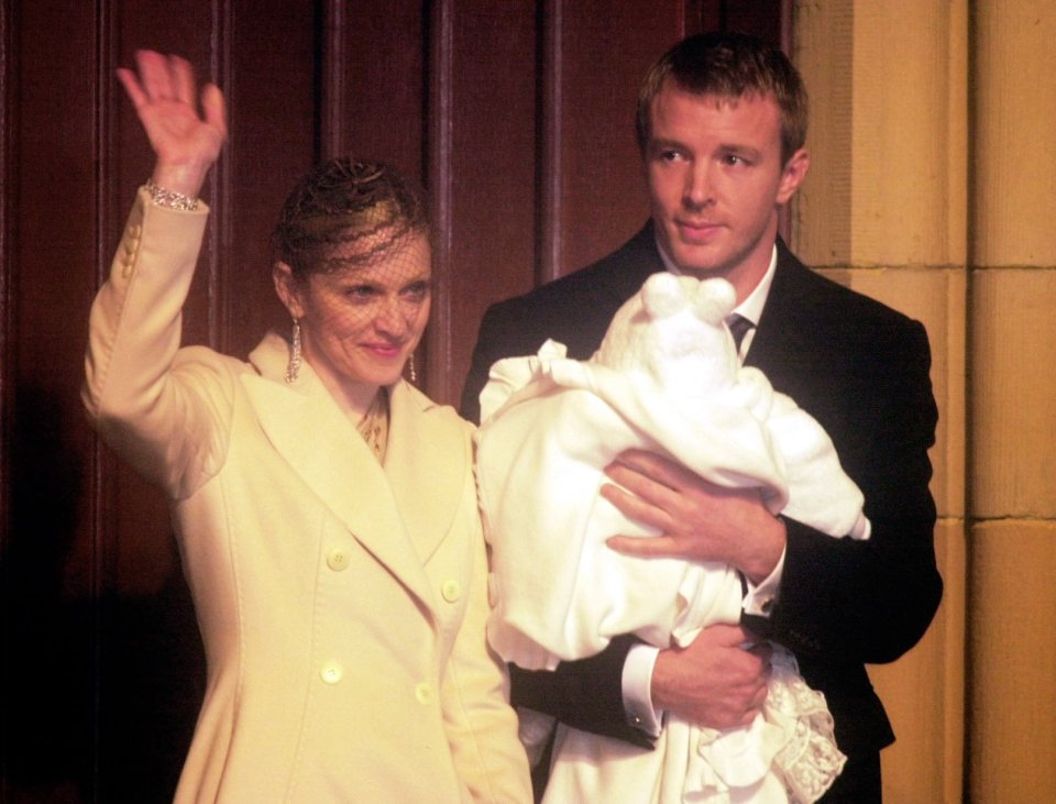  The couple leave their son Rocco's christening in 2000