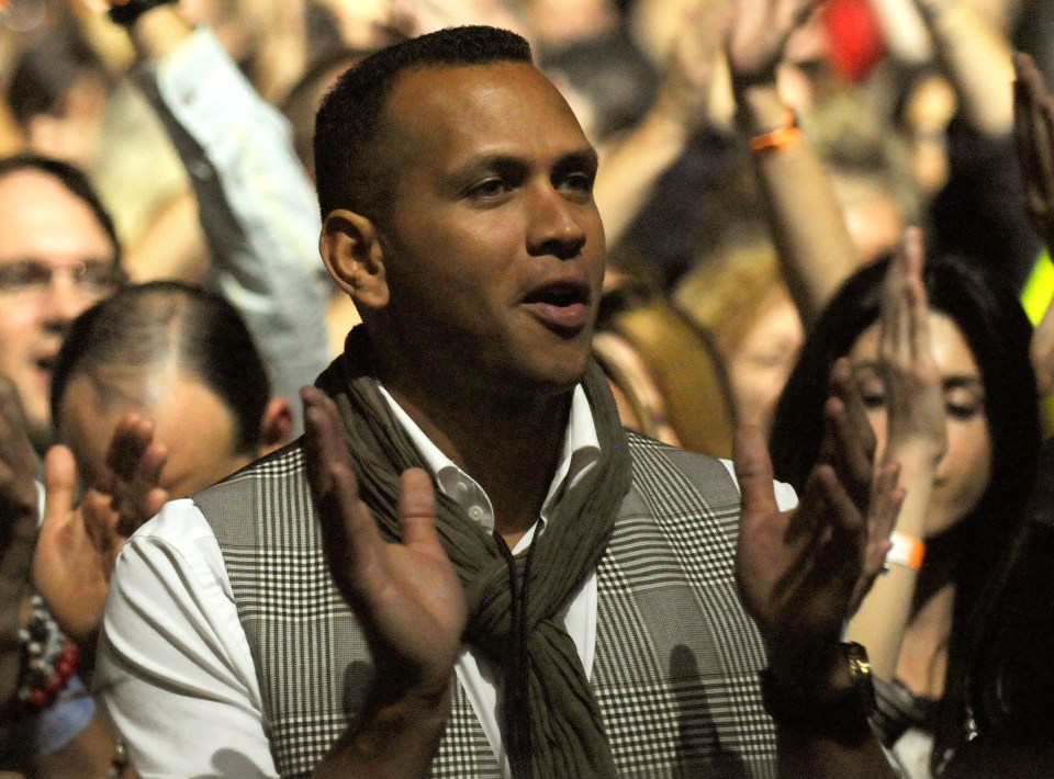  Alex Rodriguez applauds during Madonna's 'Sticky & Sweet' tour in Florida in November 2008