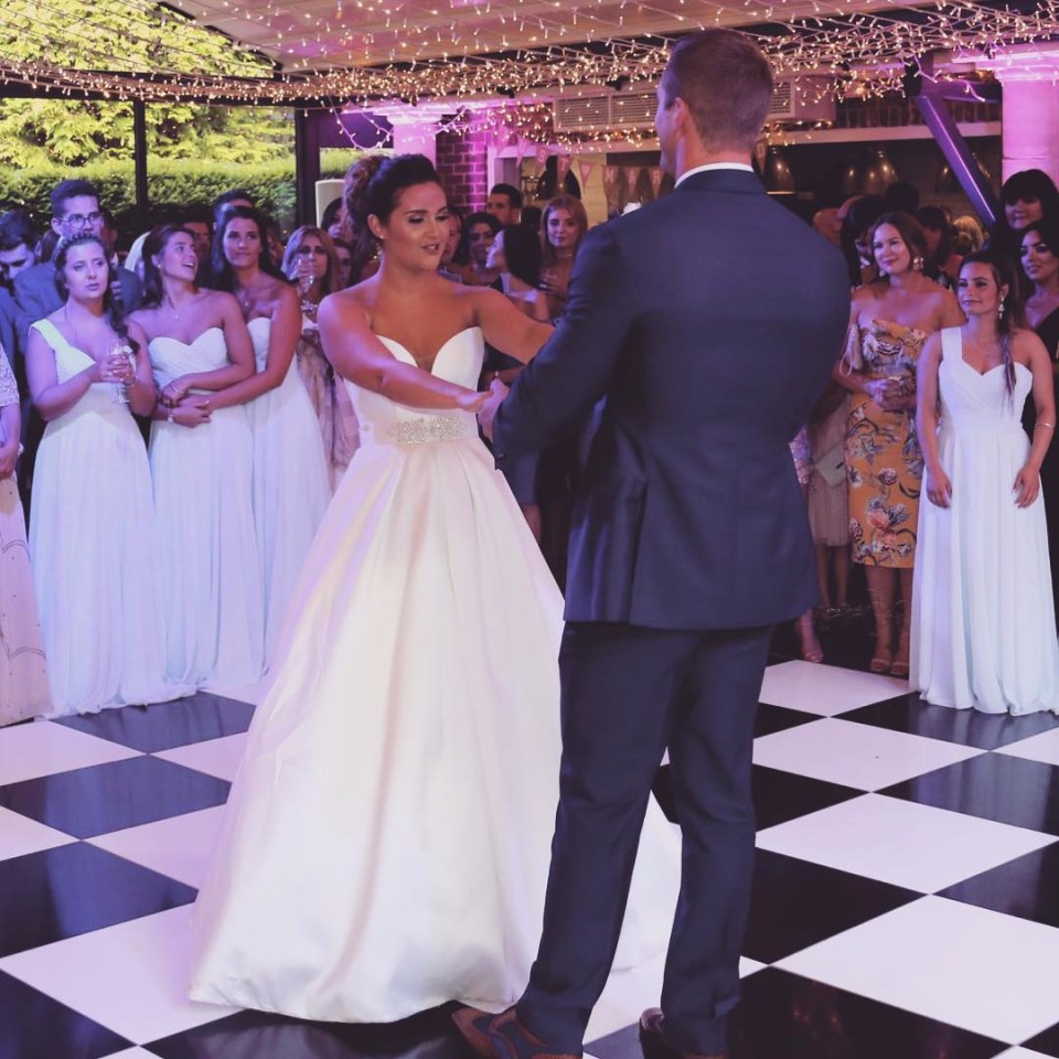  The couple take to the dance floor, as their loved ones watch on