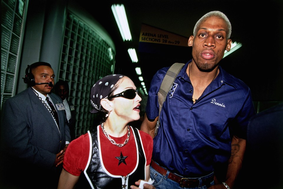  Dennis Rodman is pictured with Madonna after playing an NBA game in LA in 1994