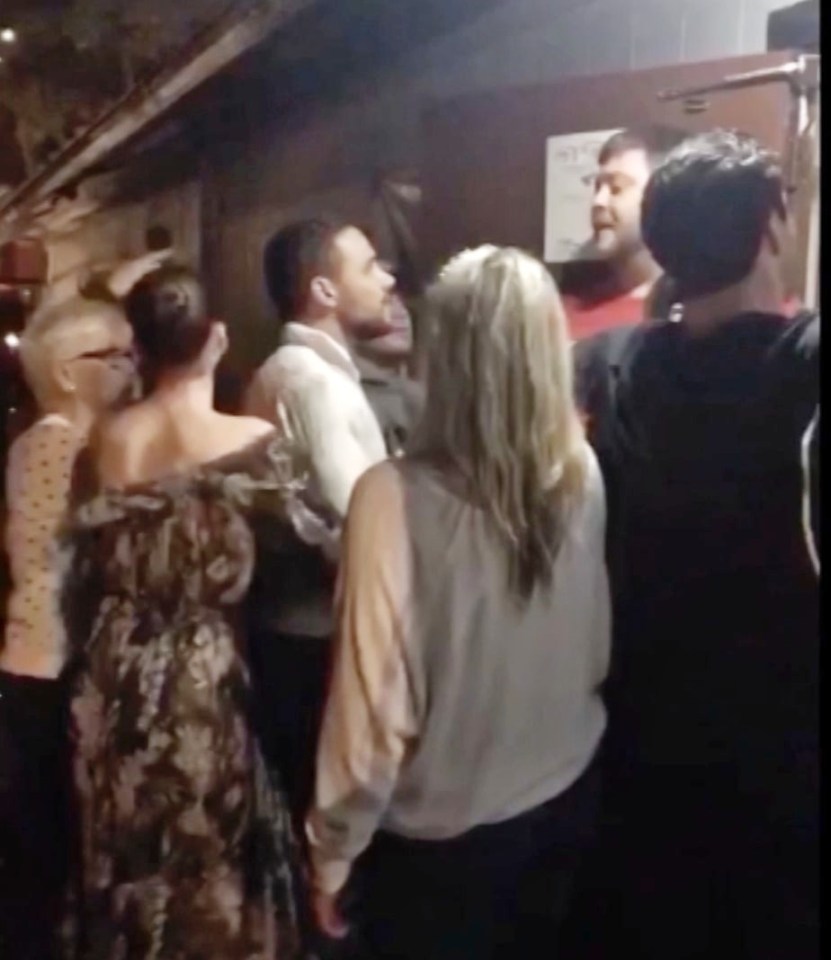 The 26-year-old old yells at someone off camera, telling them ‘don’t f*****g push me’