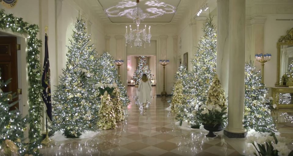  The video showed the First Lady walk through her lavishly decorated hallway