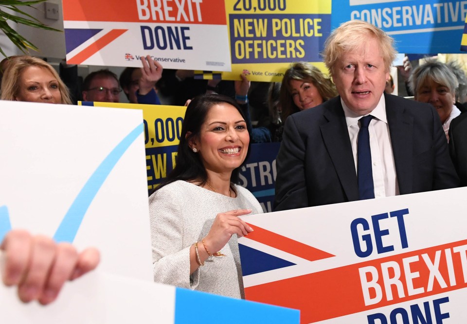  Boris and Home Secretary Priti Patel attend a members rally held at Colchester printworks