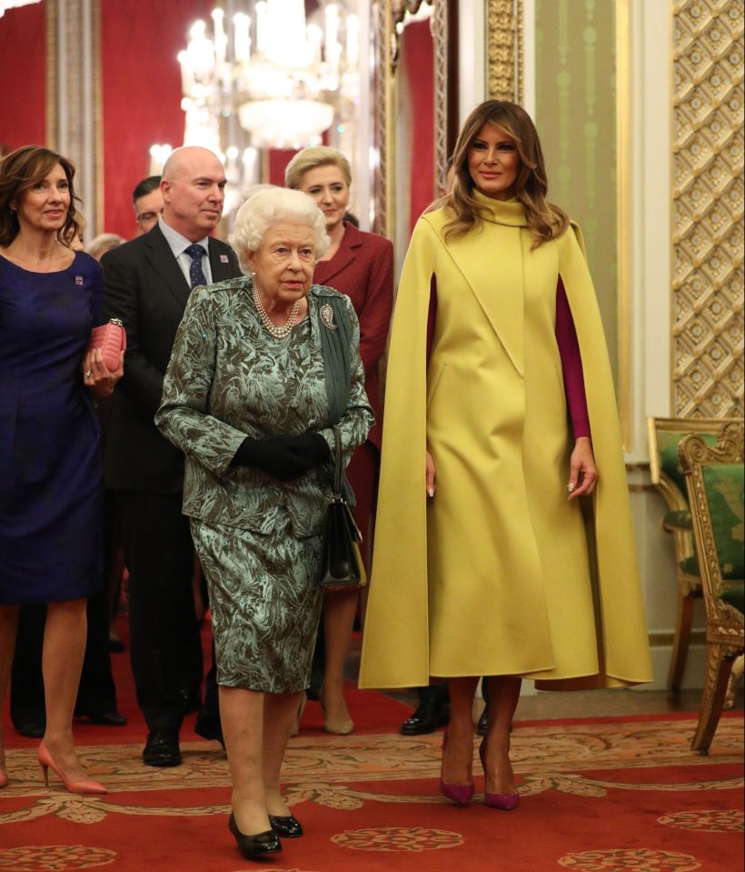  The Queen walking with Melania Trump in Buckingham Palace