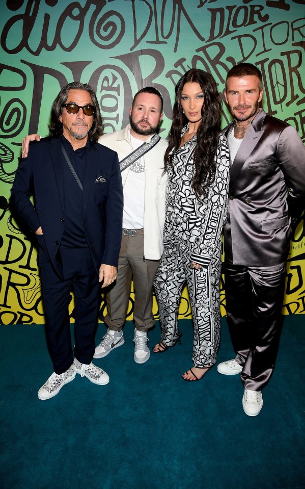  Shawn Stussy, Kim Jones, Bella Hadid and David Beckham cosy up for a photo on the blue carpet