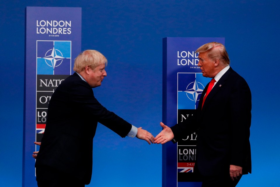 Boris Johnson and Donald Trump embrace during Nato talks in London this month