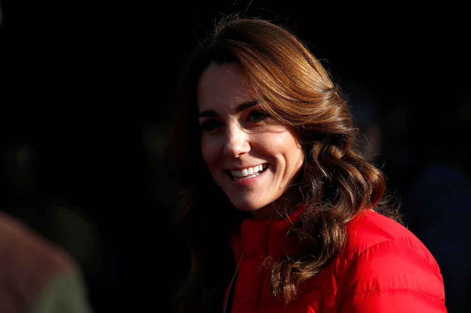 Kate Middleton smiles as she arrives at the Christmas tree farm