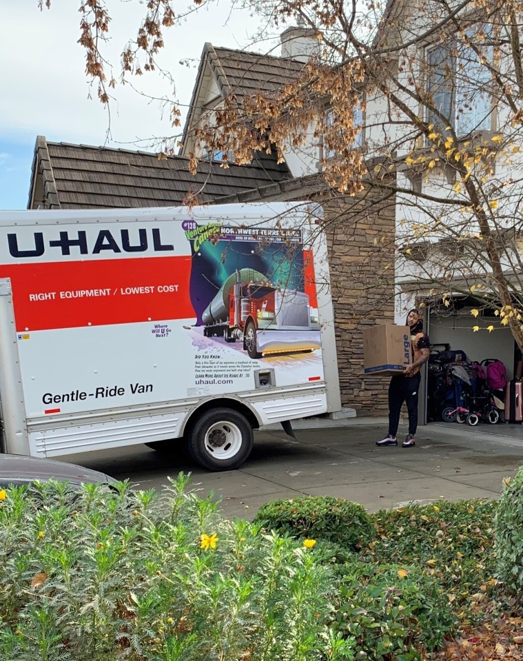  He dressed in casual clothing as he loaded up the U-Haul van