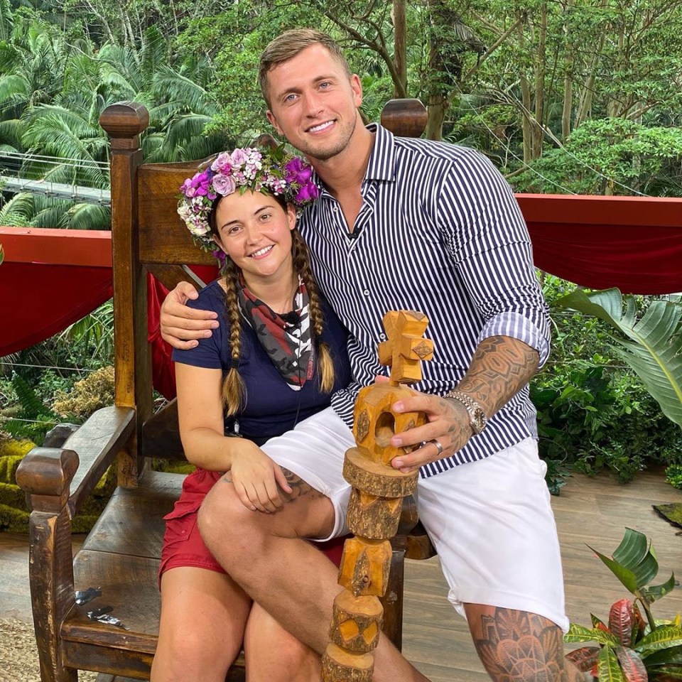  Jacqueline and Dan cuddle up to each other following the actress's I'm A Celebrity victory