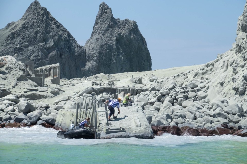  Tour operators are seen evacuating people around 12 minutes after the eruption