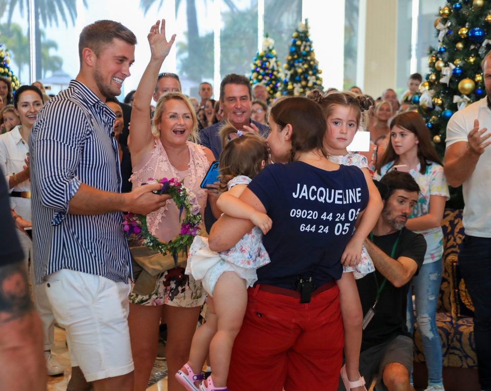  She is reunited with her daughters following her win