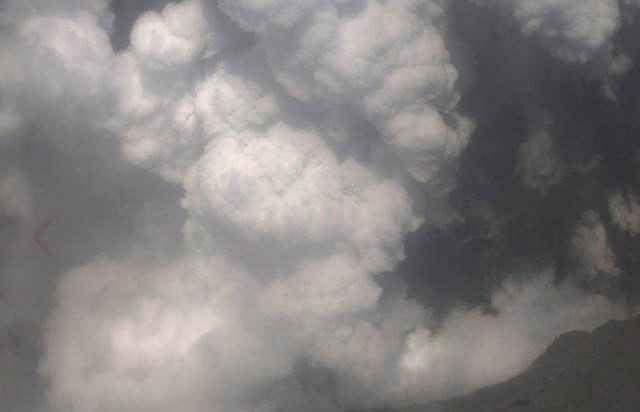  Smoke is pictured billowing above the island