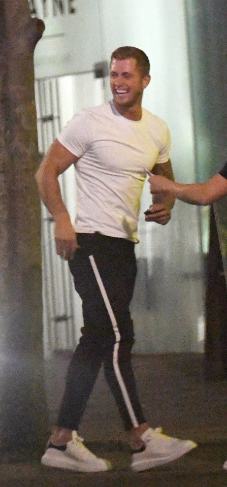 Pictures show Dan Osborne laughing on his way in to the hotel