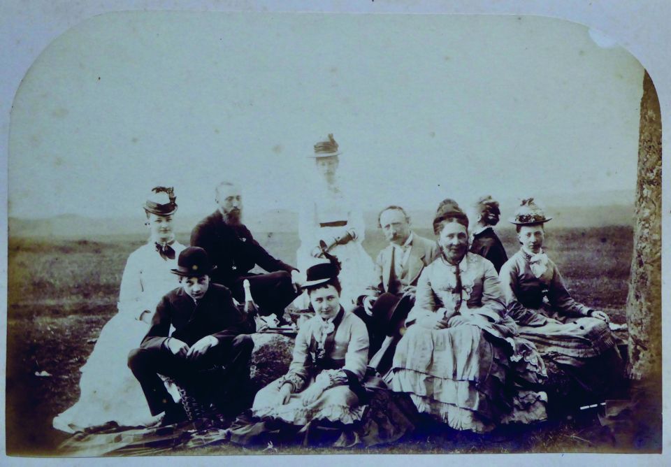 English Heritage also found a picture of a a group sitting on stones - which is now only allowed on special occasions