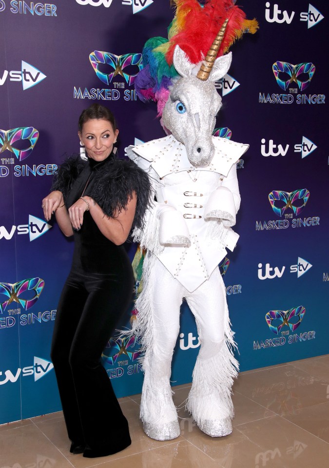  Davina McCall strikes a pose alongside a unicorn