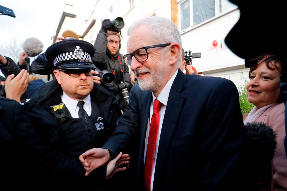  Jeremy Corbyn surrounded by press as he leaves his house on Friday morning after Boris's massive victory