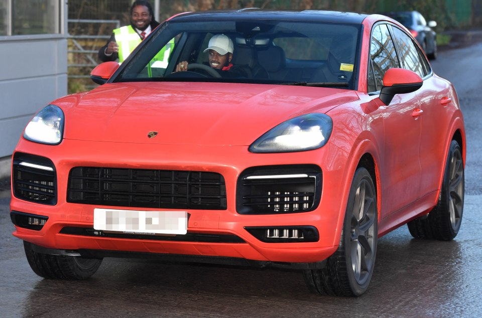  Midfielder Fred was all smiles as he sat in his red Ferrari